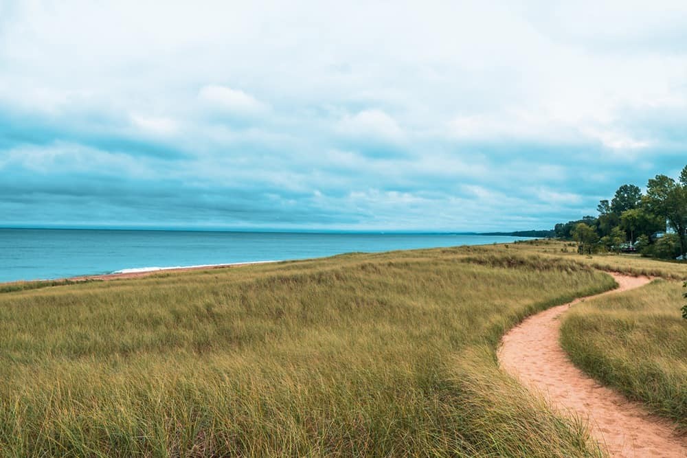 grass and sand path to shore of lake Michigan near Lake Forest, IL