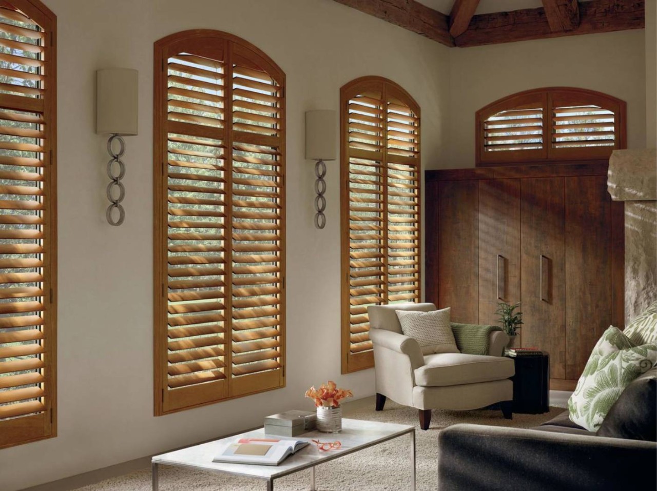 Hunter Douglas Heritance® Wood Shutters with the Louvers Open Letting in Light to a Seating Area near Arlington Heights, IL